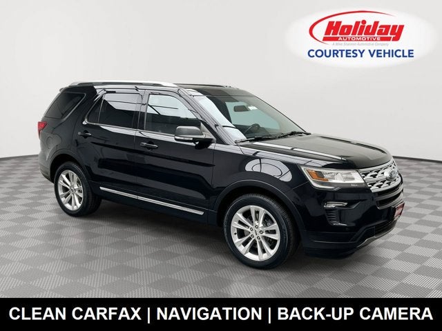 2019 Ford Explorer XLT in Agate Black Metallic — front three-quarter view