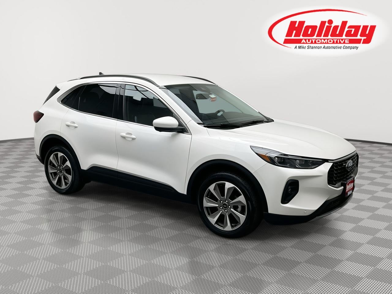 2024 Ford Escape Platinum in Star White Metallic Tri-Coat — front three-quarter view