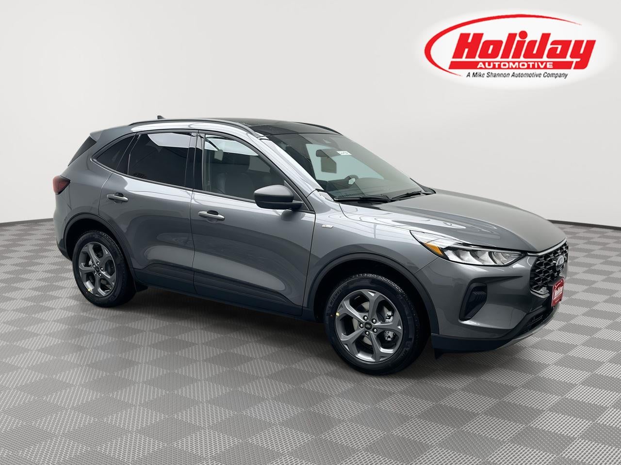2026 Ford Escape ST-Line in Carbonized Gray Metallic — front three-quarter view