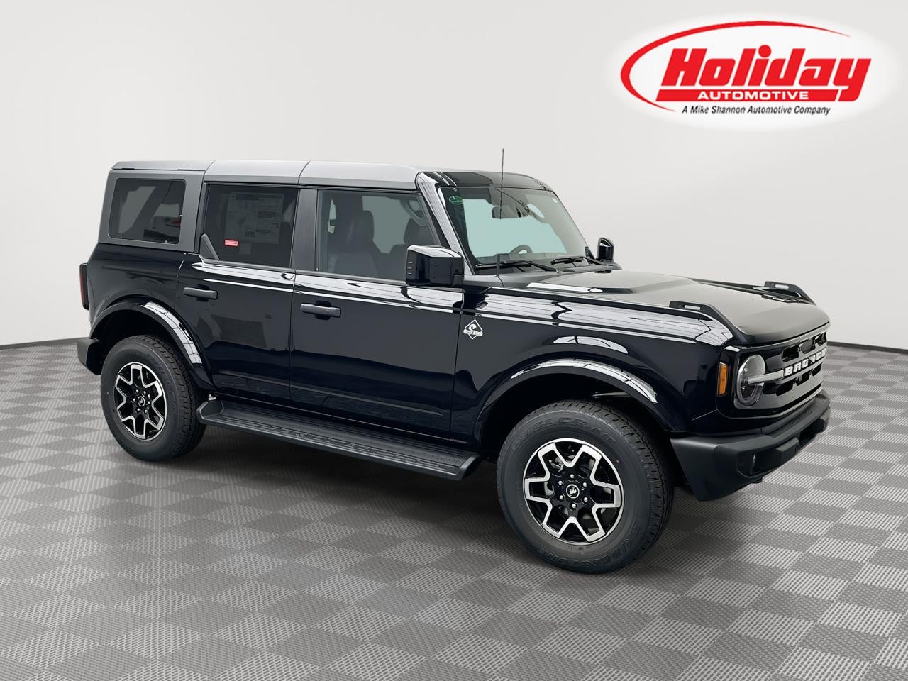 2026 Ford Bronco Outer Banks in Shadow Black — front three-quarter view