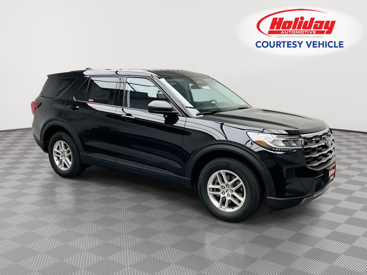 2026 Ford Explorer Active in Agate Black Metallic — front three-quarter view
