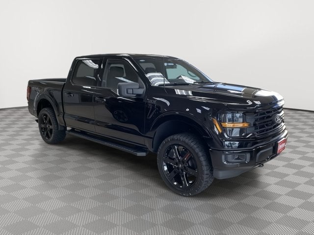 2025 Ford F-150 XLT in Agate Black Metallic — front three-quarter view