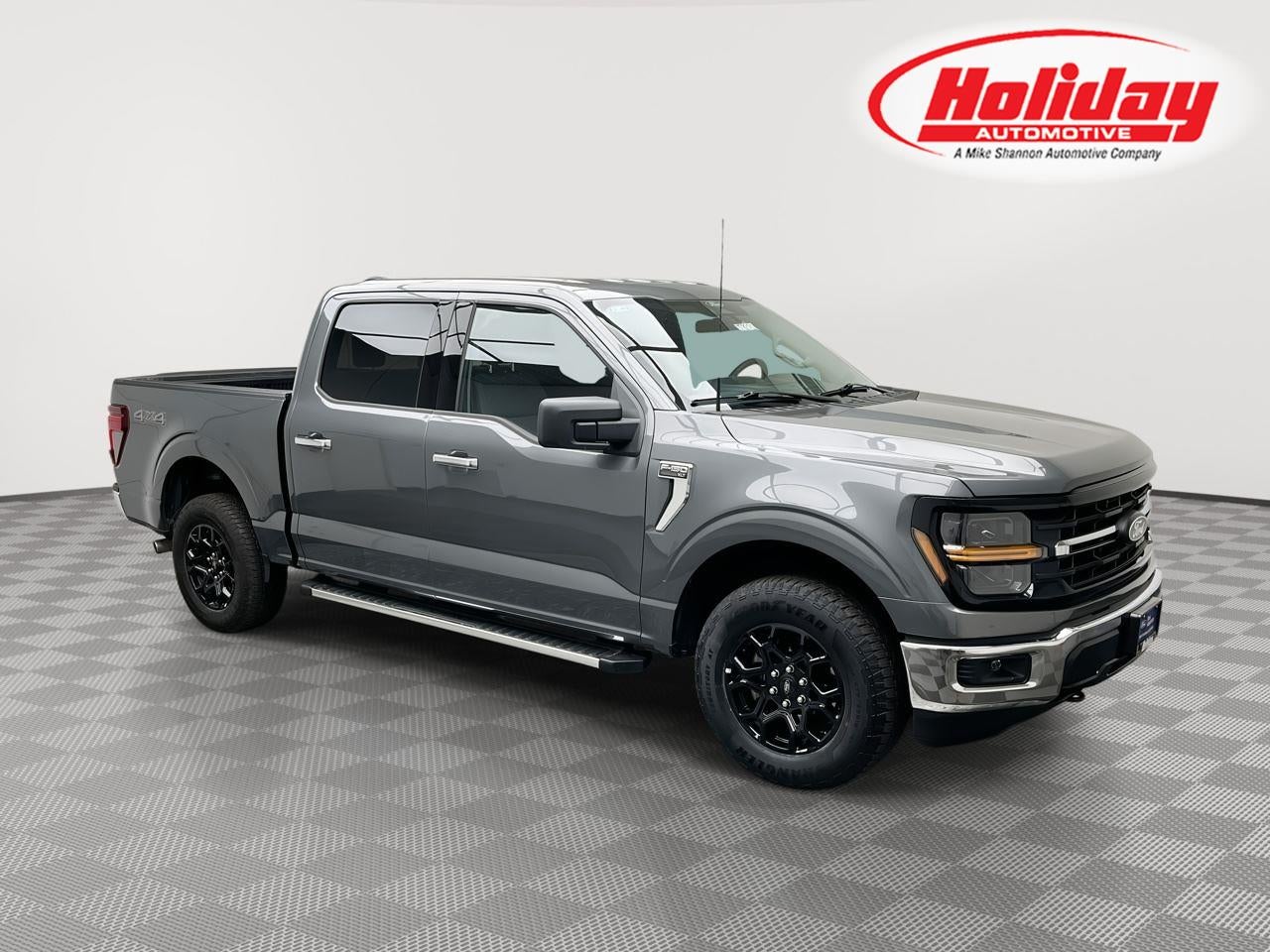 2025 Ford F-150 XLT in Carbonized Gray Metallic — front three-quarter view