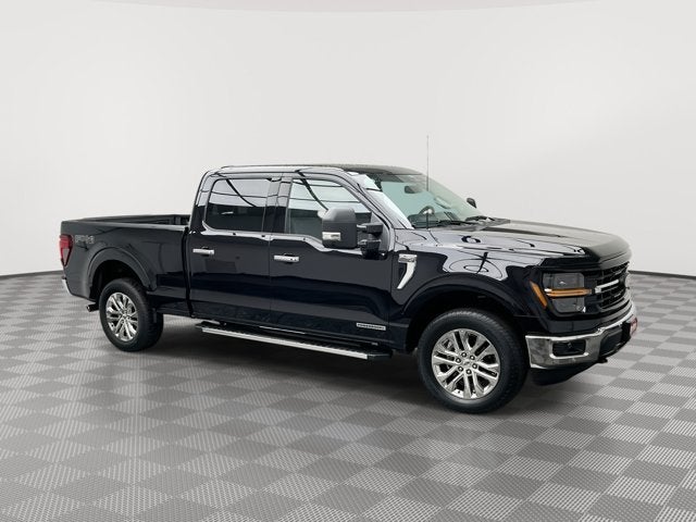 2025 Ford F-150 XLT in Agate Black Metallic — front three-quarter view