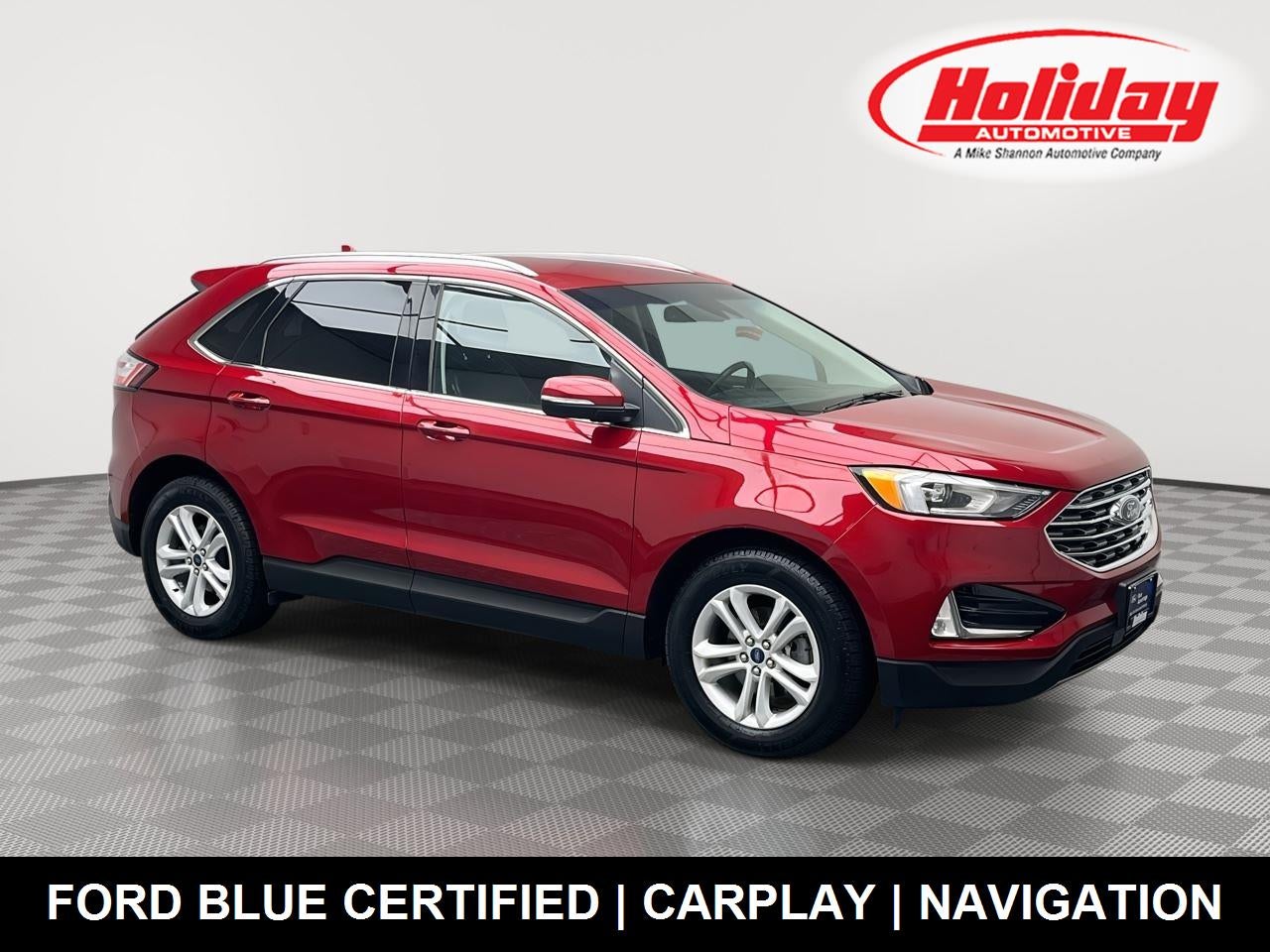 2020 Ford Edge SEL in Rapid Red Metallic Tinted Clearcoat — front three-quarter view