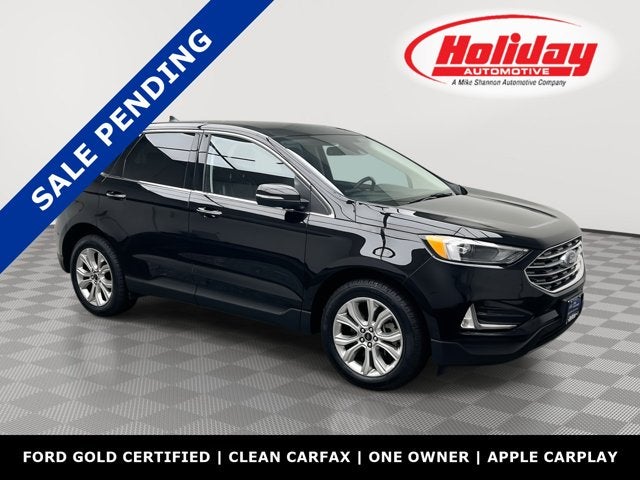 2024 Ford Edge Titanium in Agate Black Metallic — front three-quarter view