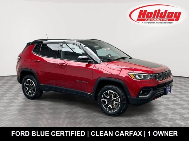 2025 Jeep Compass Trailhawk in Red Hot Pearlcoat — front three-quarter view