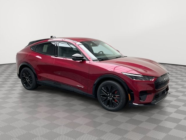 2025 Ford Mustang Mach-E Premium in Molten Magenta Metallic Tinted Clearcoat — front three-quarter view