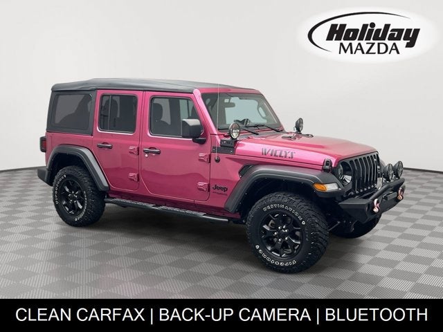 2022 Jeep Wrangler Unlimited Willys in Limited Edition Tuscadero Pearlcoat — front three-quarter view