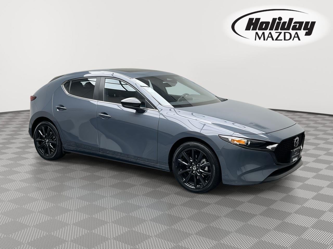 2026 Mazda Mazda3 Hatchback 2.5 S Carbon Edition in Polymetal Gray Metallic — front three-quarter view