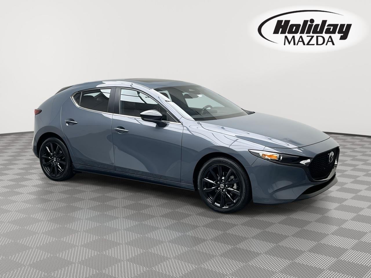 2026 Mazda Mazda3 Hatchback 2.5 S Carbon Edition in Polymetal Gray Metallic — front three-quarter view