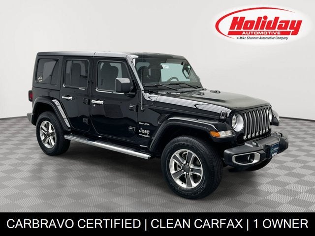 2022 Jeep Wrangler Unlimited Sahara in Black Clearcoat — front three-quarter view