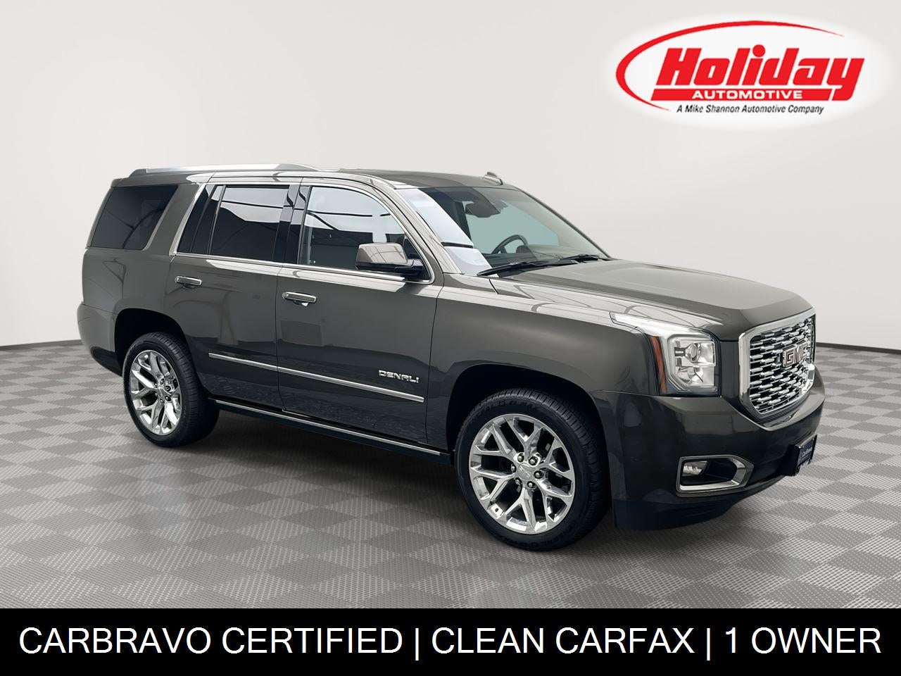 2019 GMC Yukon Denali in Smokey Quartz Metallic — front three-quarter view