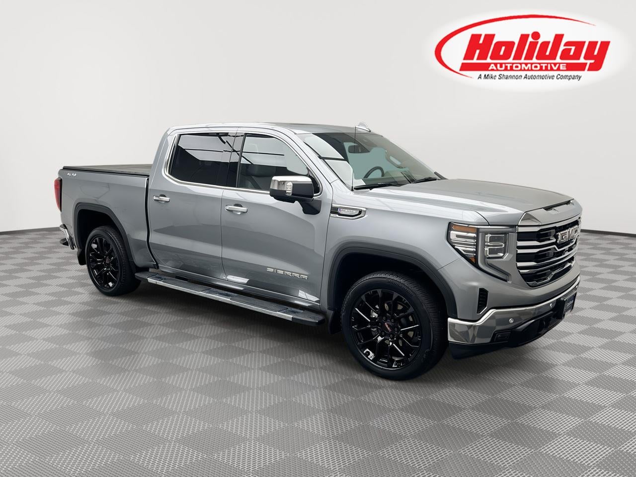 2026 GMC Sierra 1500 SLT in Sterling Metallic — front three-quarter view