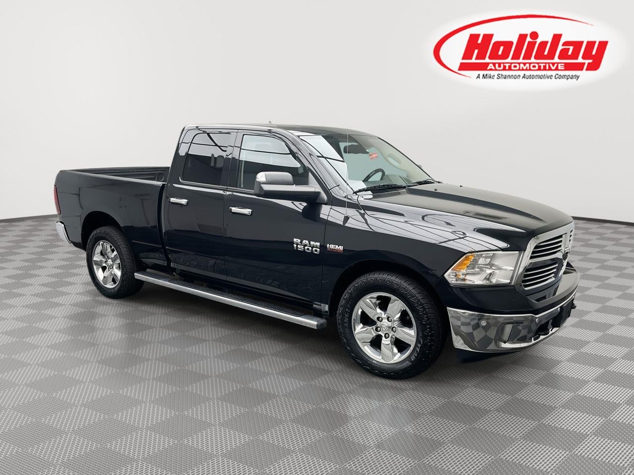 2016 RAM 1500 Big Horn in Brilliant Black Crystal Pearlcoat — front three-quarter view