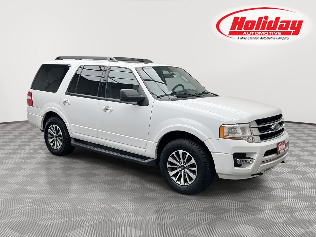 2017 Ford Expedition XLT in Oxford White — front three-quarter view