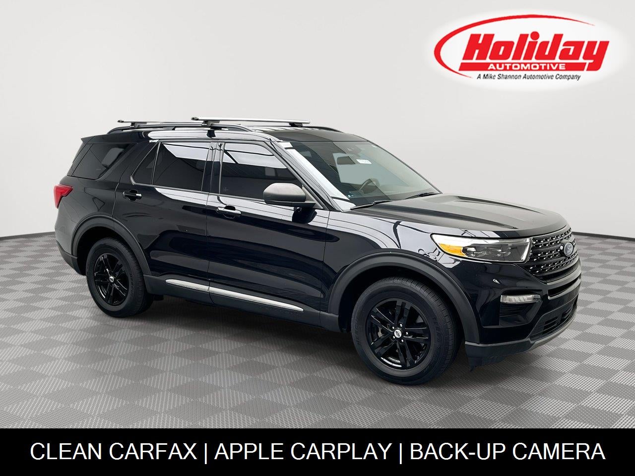 2020 Ford Explorer XLT in Agate Black Metallic — front three-quarter view