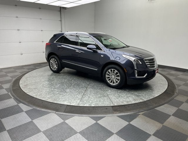 2019 Cadillac XT5 Luxury in Harbor Blue Metallic — front three-quarter view