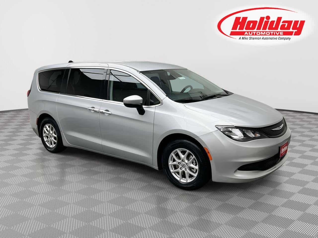2023 Chrysler Voyager LX in Silver Mist Clearcoat — front three-quarter view
