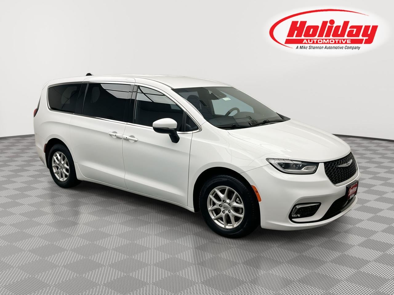 2023 Chrysler Pacifica Touring in Bright White Clearcoat — front three-quarter view