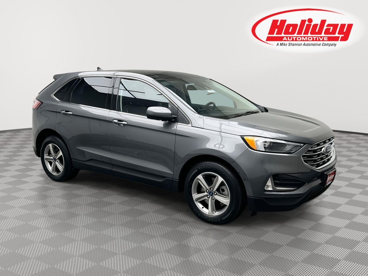 2022 Ford Edge SEL in Carbonized Gray Metallic — front three-quarter view