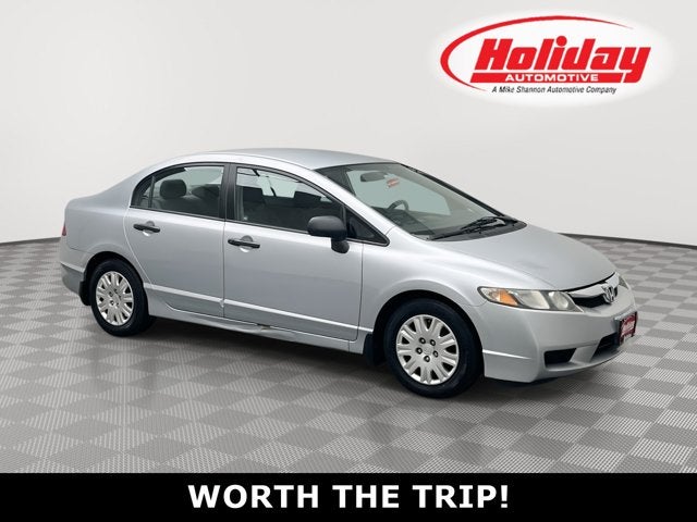 2009 Honda Civic Sdn DX-VP in Alabaster Silver Metallic — front three-quarter view