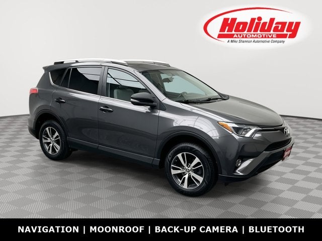 2016 Toyota RAV4 XLE in Magnetic Gray Metallic — front three-quarter view