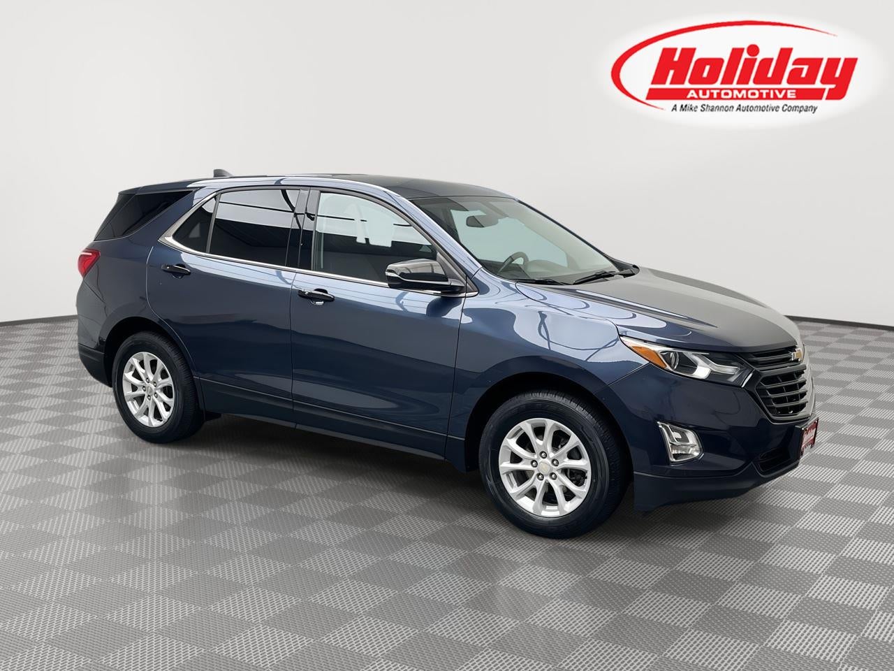 2018 Chevrolet Equinox LT in Storm Blue Metallic — front three-quarter view