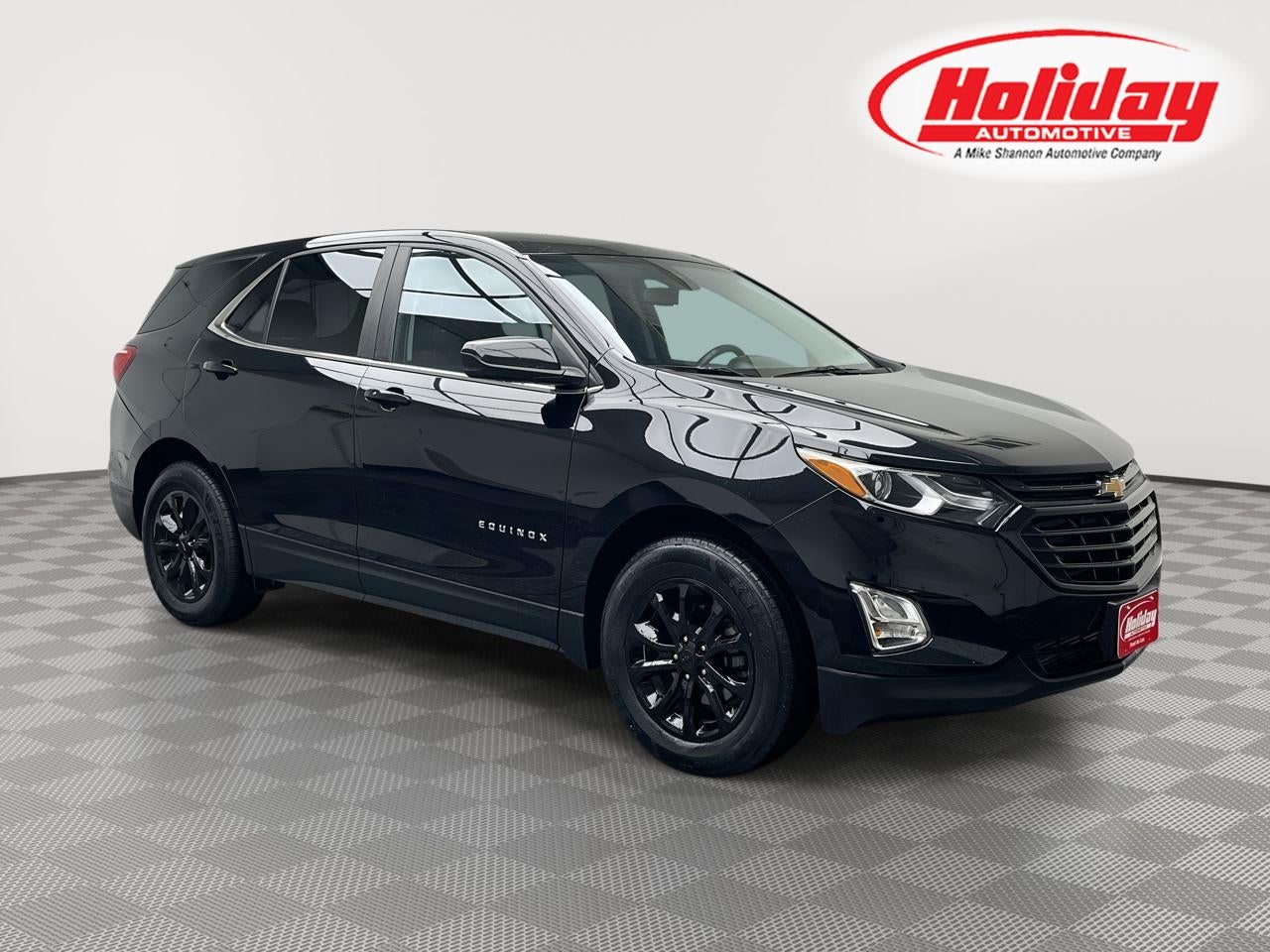 2021 Chevrolet Equinox LT in Mosaic Black Metallic — front three-quarter view