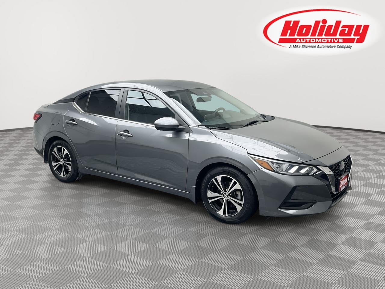 2022 Nissan Sentra SV in Gun Metallic — front three-quarter view