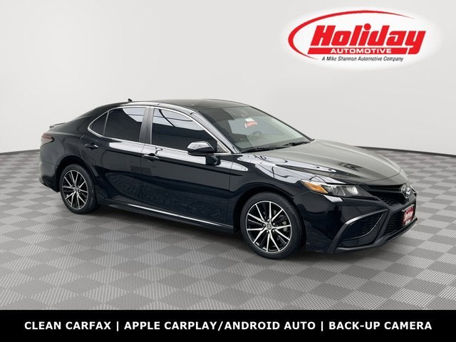2021 Toyota Camry SE Nightshade in Midnight Black Metallic — front three-quarter view