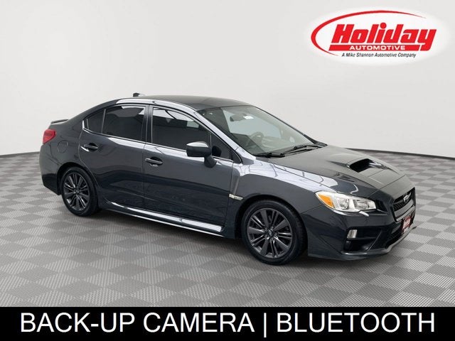 2017 Subaru WRX Manual in Dark Gray Metallic — front three-quarter view